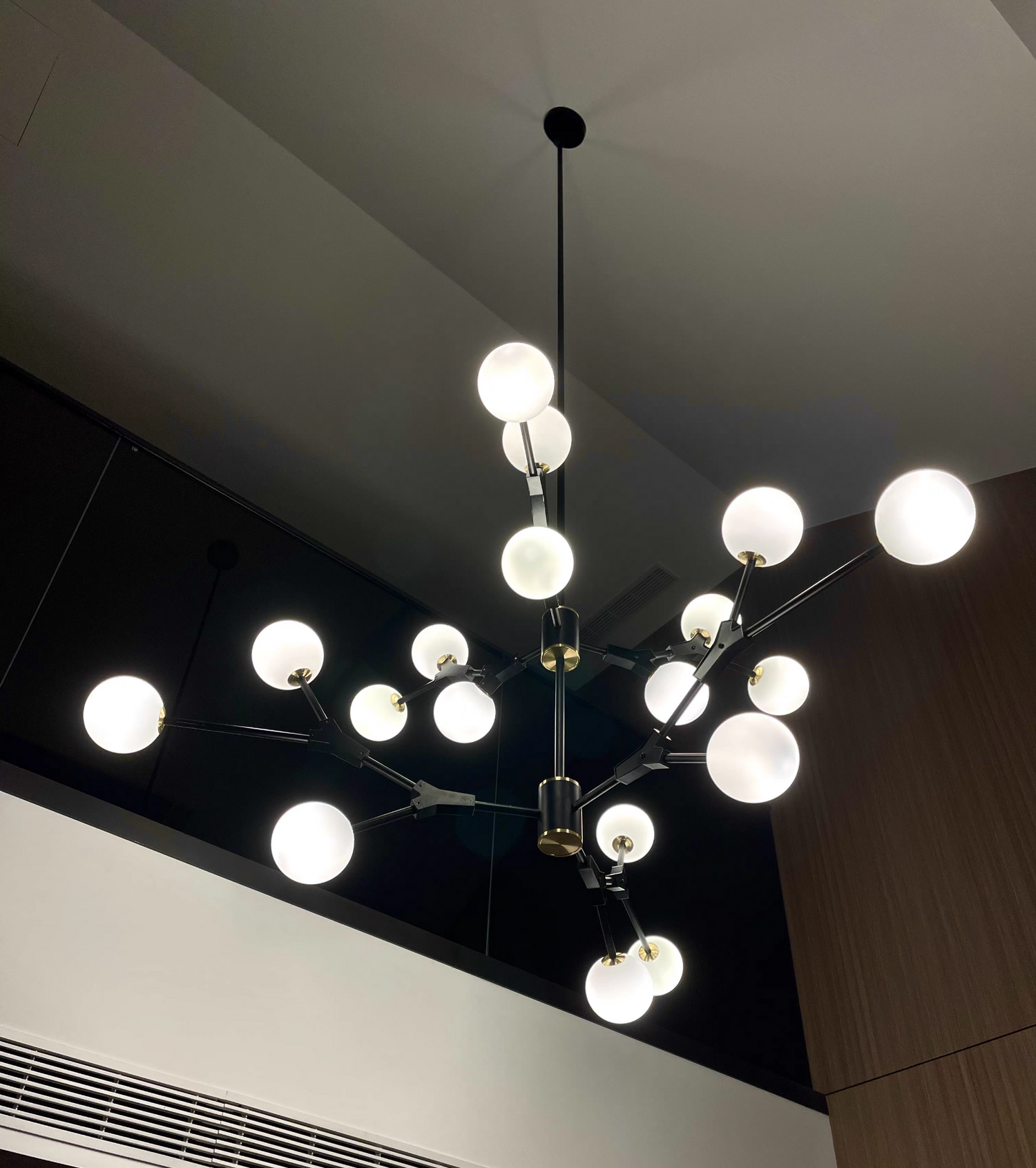 A close-up of handblown opal glass shades highlights their unique textures and craftsmanship.