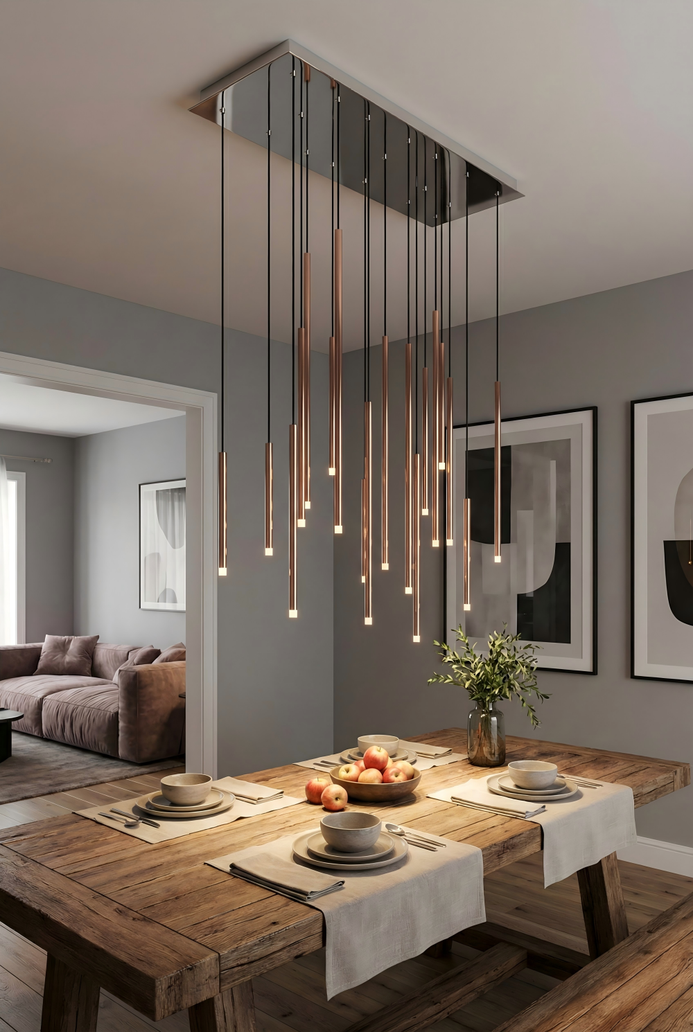 Modern dining room with wooden table, decorative lighting, and gray walls.