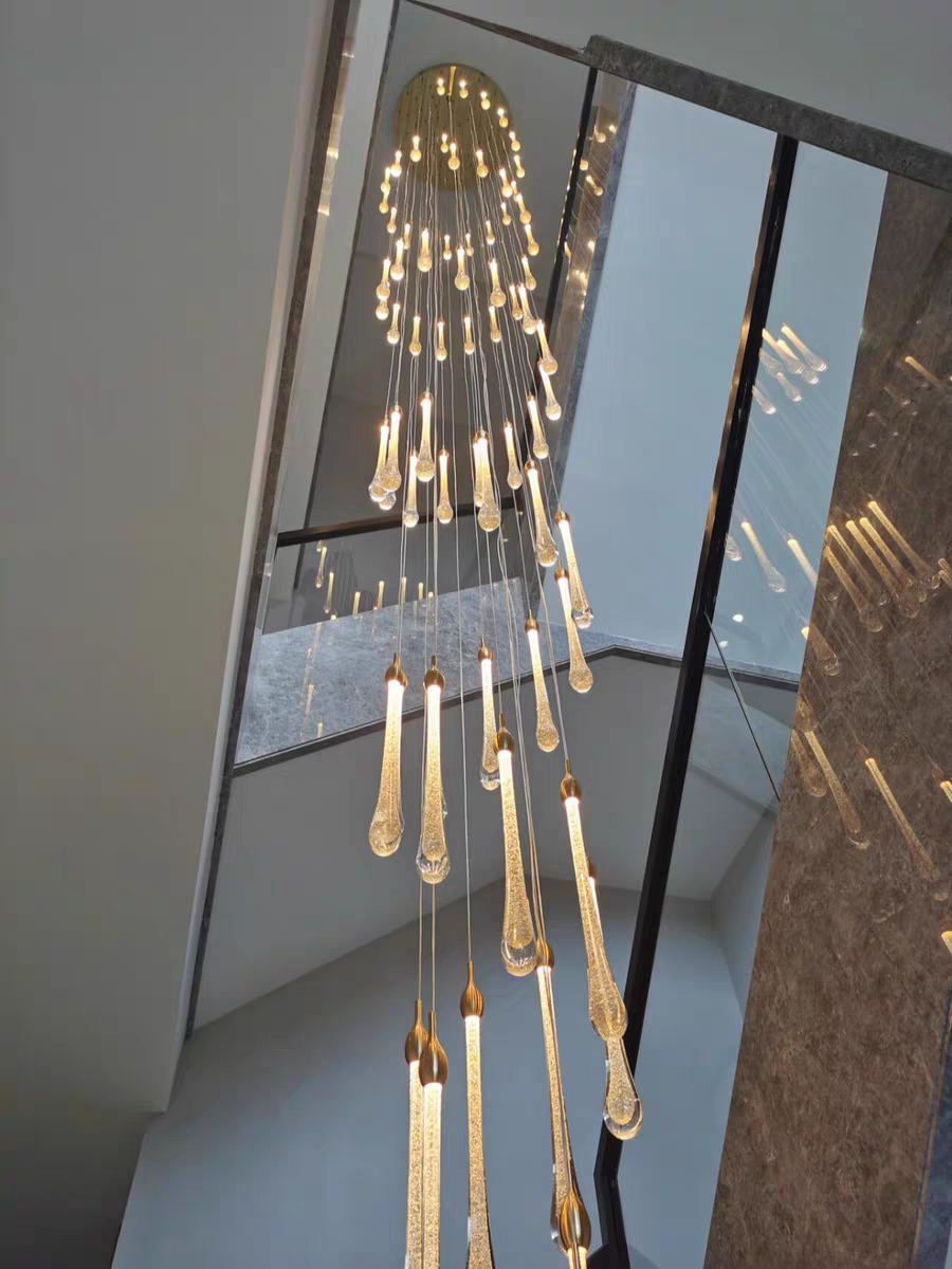 The ambient effect of the celestial chandelier, casting soft, patterned light that enhances architectural details.