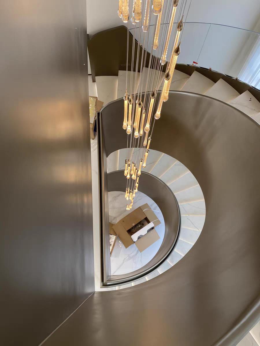 Overhead view of the 30-light spiral chandelier, revealing its elegant pendant arrangement.
