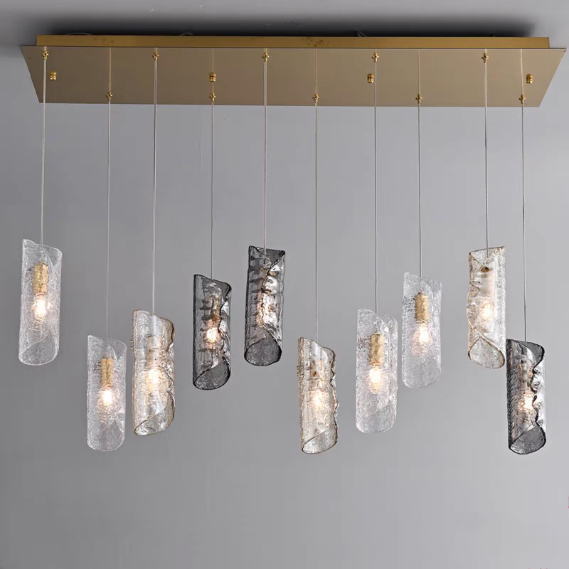 Side shot of the 10-light Frosted Glass Chandelier with rectangular canopy, displaying its elongated form.