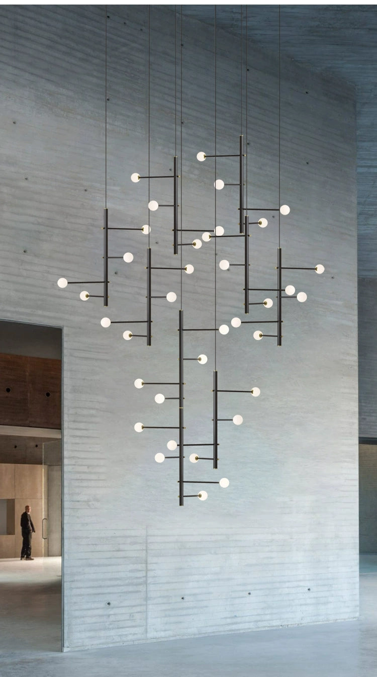 Close-up of white glass globes on the 36-light mixed style chandelier, emphasizing craftsmanship.