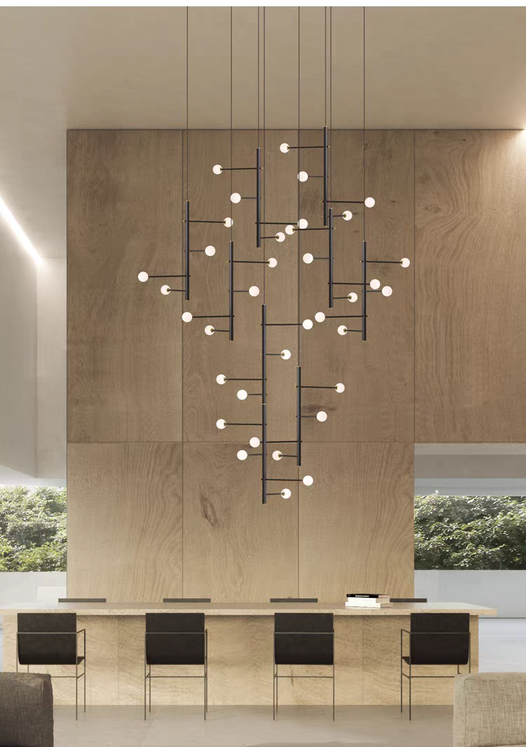 Lifestyle image of the 36-light mixed style chandelier in a grand dining room, creating a serene ambiance.