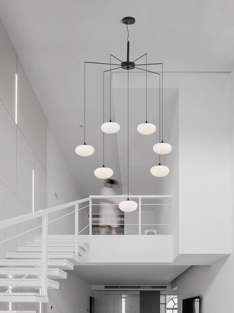 Detailed view of the chandelier’s steel holders and LED integration, showcasing craftsmanship.