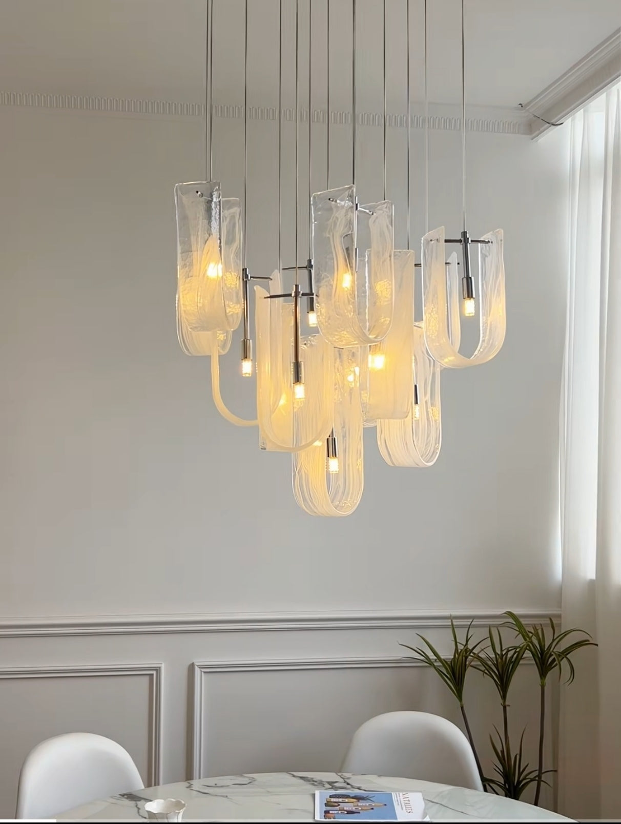 Side view of 19-light Nebula Wave Chandelier, showcasing its impressive size and design