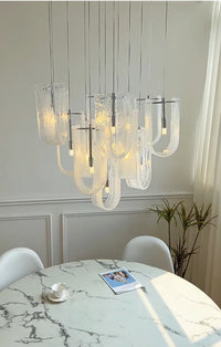 Thumbnail for Modern dining area with installed Nebula Wave Chandelier