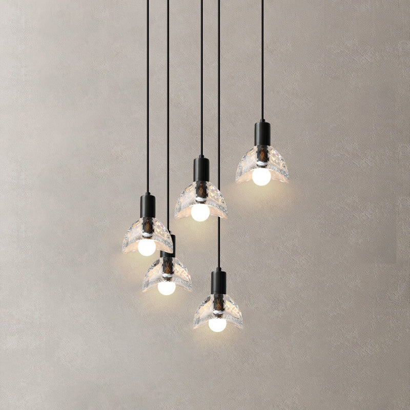A cluster of glass chandeliers with a matte black finish and metal supports, featuring LED lights.