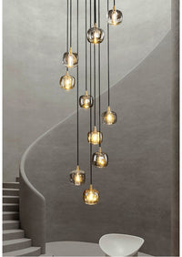 Thumbnail for Lifestyle image of the 10-light pendant lights in a grand foyer, casting a welcoming glow.