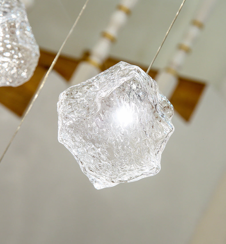 Close-up of a mouth-blown glass shade, revealing its stone-inspired texture and light diffusion.