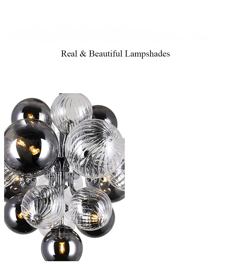 Close-up of a hand-blown glass shade from the 19-light variant, revealing intricate texture and light diffusion.
