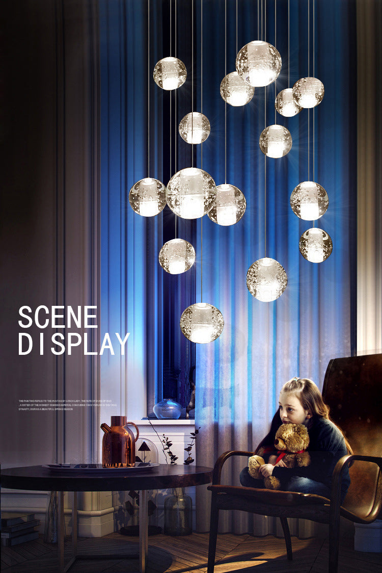 The chandelier in a cozy bedroom setting, providing an inviting crystal glow.