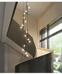 Thumbnail for The enduring appeal of the linear white glass globe chandelier: a timeless fusion of modern simplicity and beautiful light.