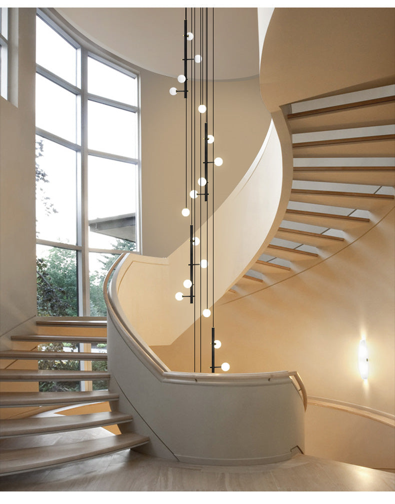 Graceful side profile of the linear white glass globe chandelier, demonstrating its slender form and understated elegance.