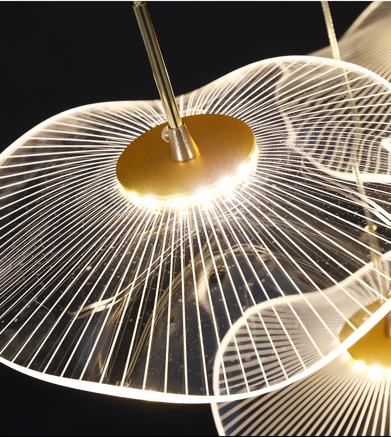 Close-up of the integrated LED lighting within the acrylic tiers, showcasing energy efficiency.