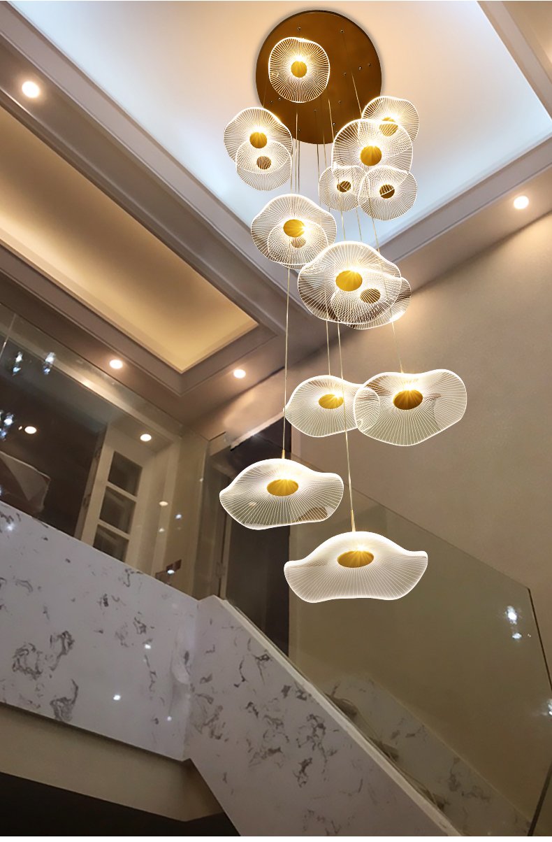 View from below the Luminous Strata pendant, emphasizing its beautiful layered, glowing disc composition.