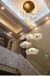 Thumbnail for View from below the Luminous Strata pendant, emphasizing its beautiful layered, glowing disc composition.