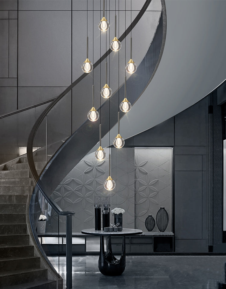 Lifestyle image of the 28-light chandelier in a luxurious entryway, showcasing its radiant crystal design.