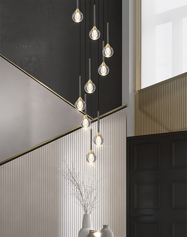 The Ethereal Cascade pendant light casting a warm, inviting glow in a contemporary interior.