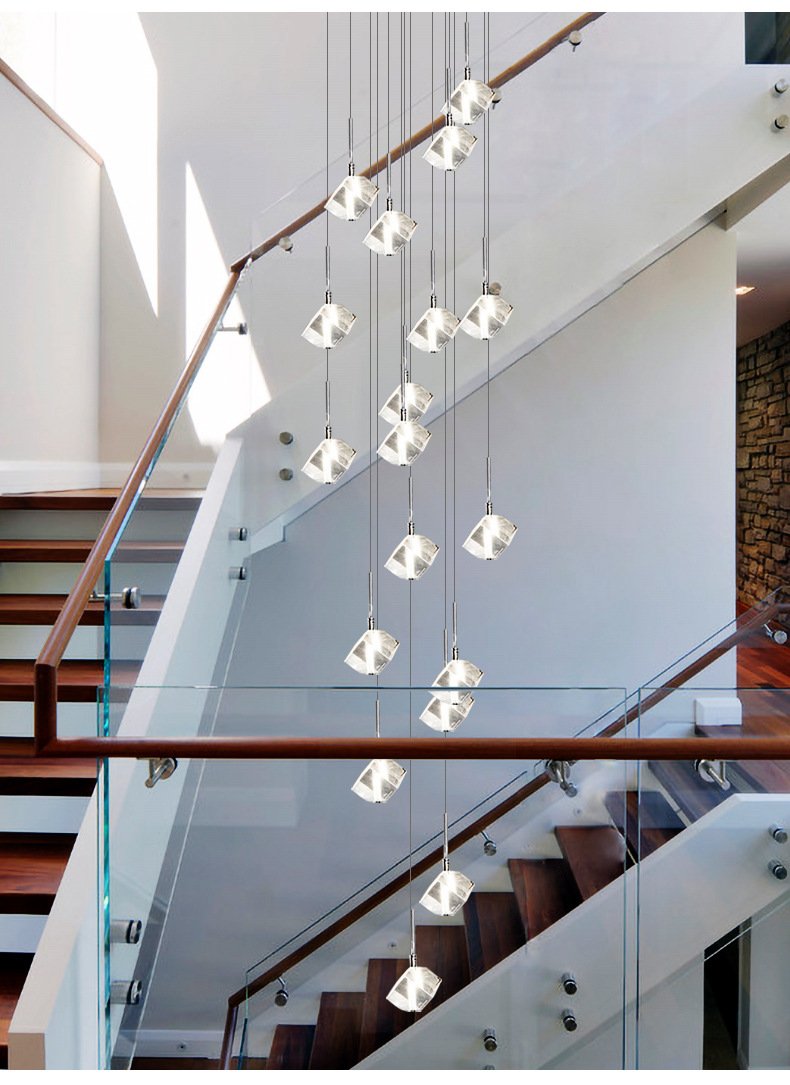 modern dining room chandelier in warm lighting