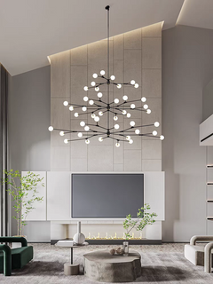 A side view highlights the 45-light Branches Chandelier’s height and warm LED glow.