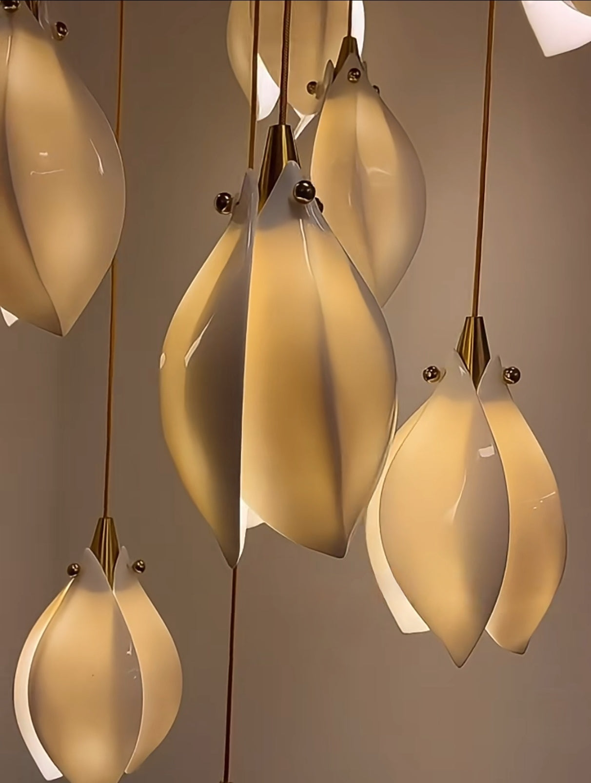 Close Up image of the Ceramic LED Cluster Bloom chandelier, creating the warm lighting.