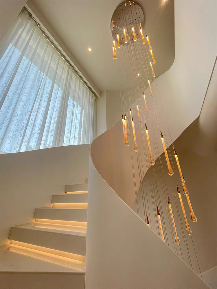 When lit, the celestial crystal chandelier emits a profound, dreamlike glow, transforming the space with serene light.