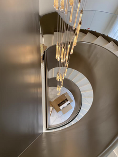 Overhead view of the 30-light spiral chandelier, revealing its elegant pendant arrangement.