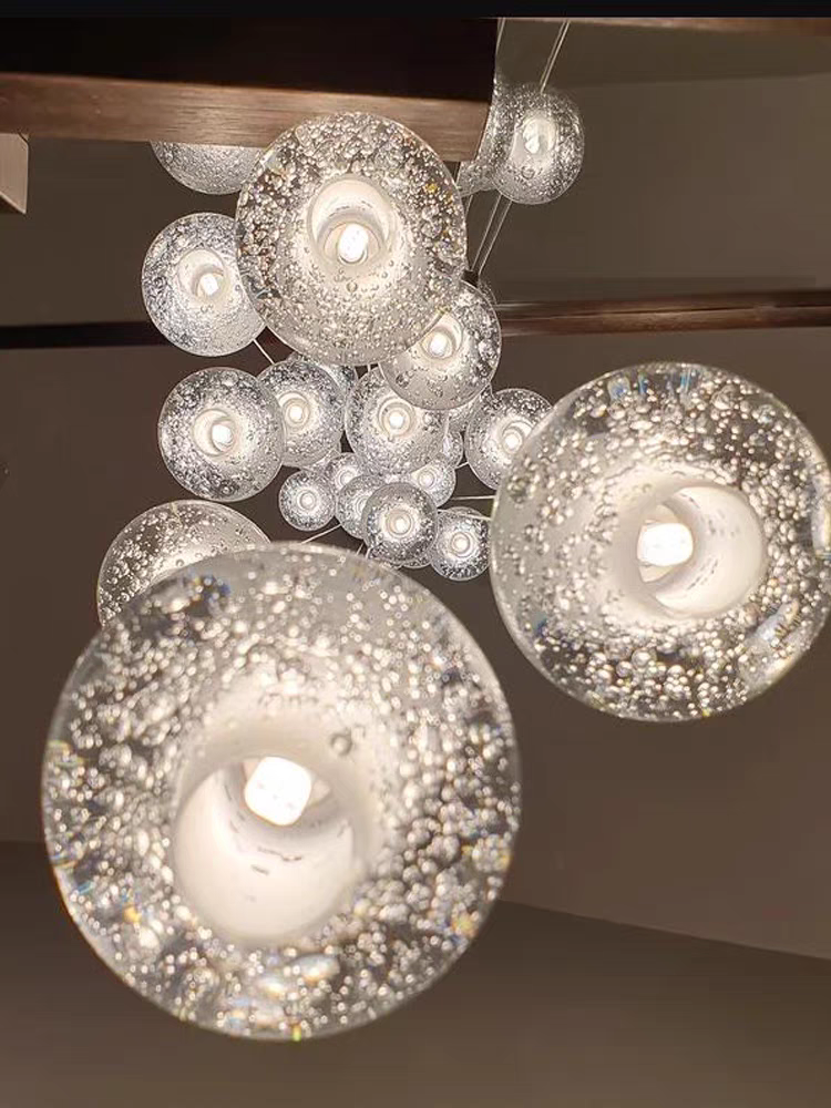 crystal chandeliers in white lighting