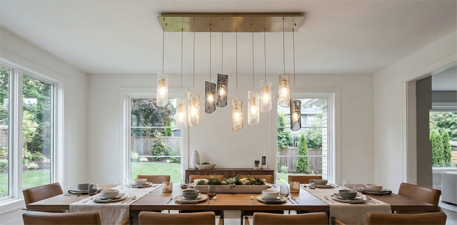 Modern dining room with a chandelier and set tables