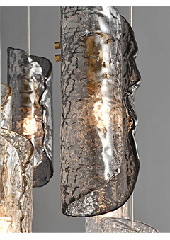 Close-up of hand-blown frosted glass shades with marble-like veining