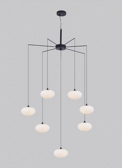 Close-up of a single white oval glass shade, emphasizing its clean, airy design.
