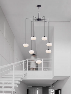 Detailed view of the chandelier’s steel holders and LED integration, showcasing craftsmanship.