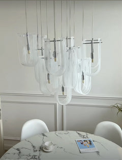 Front view of 19-light Nebula Wave Chandelier, a statement piece for grand spaces