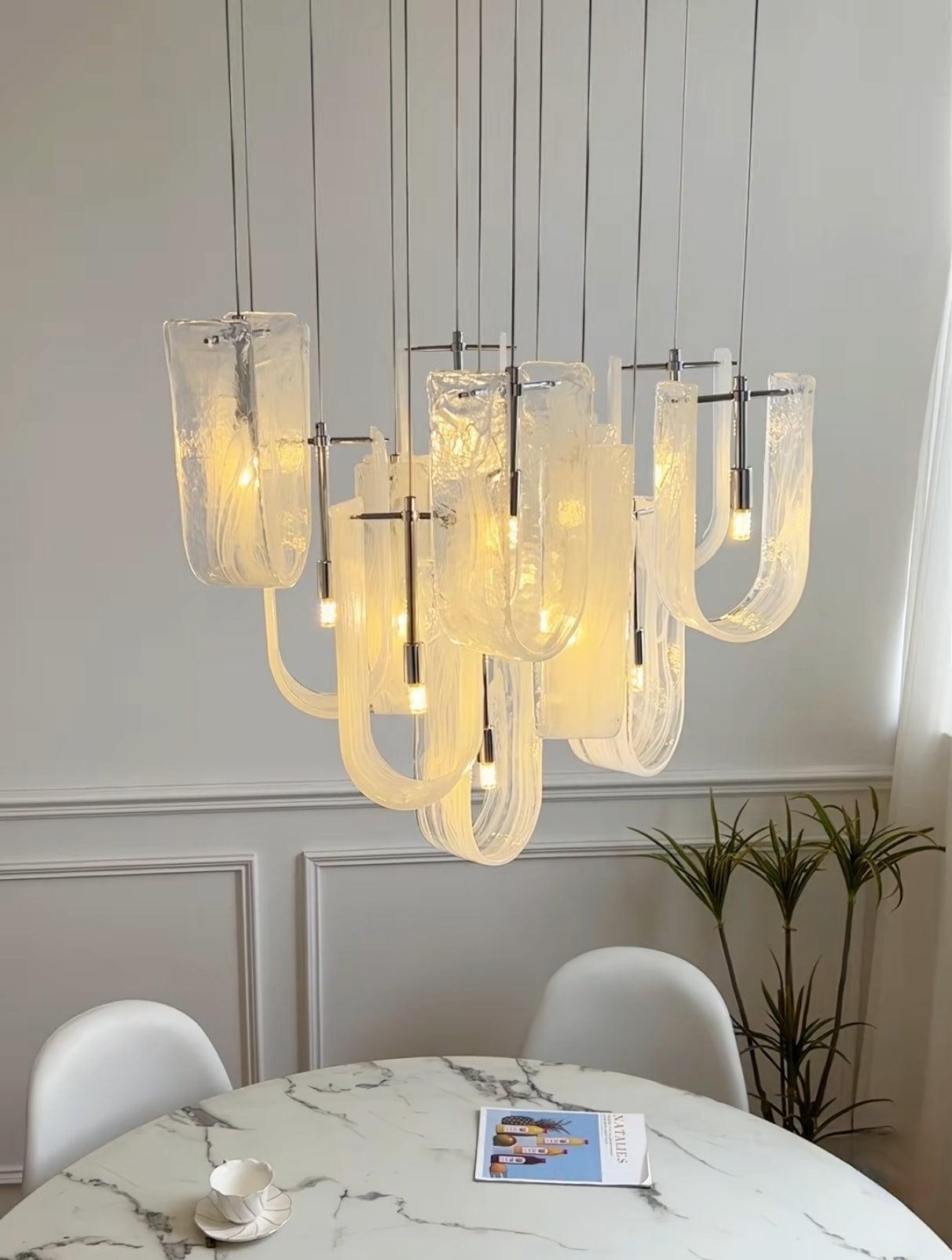 Nebula Wave Chandelier front view, modern celestial lighting design
