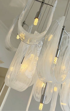 Close-up of 19-light Nebula Wave Chandelier, showcasing its impressive size and design