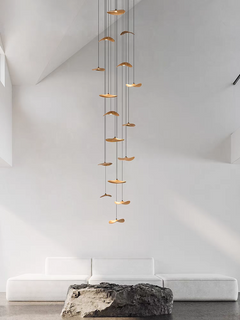 A side angle of the 16-light Wooden Shade Chandelier showcases its scale and warm LED lighting.