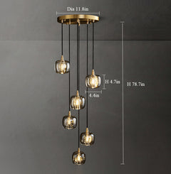 Front view of the 6-light Crystal Brass Pendant Lights, showcasing their shimmering crystal globes and brass finish.