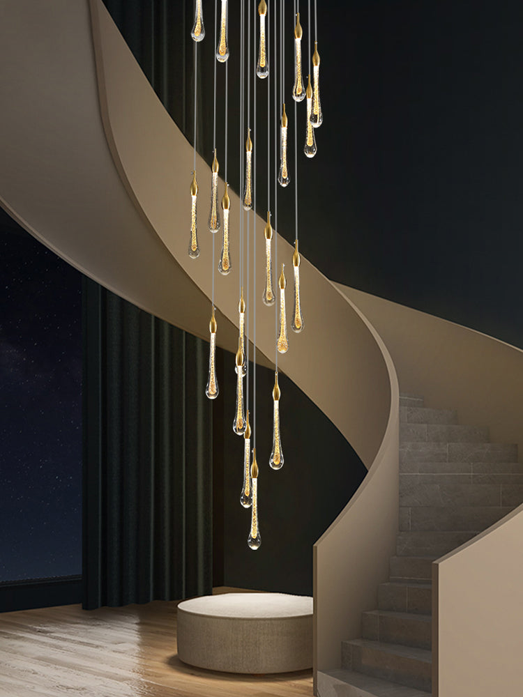 The lower tiers of the chandelier, where the crystal cascade culminates in a dense, radiant cluster.