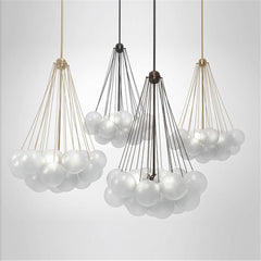 Black pendant lights over island