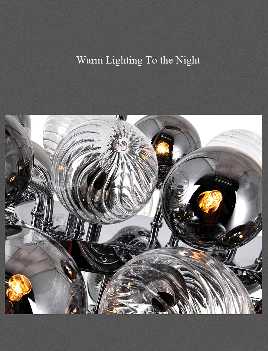 Close-up of glass shades on the 25-light variant, capturing the light’s play on their surfaces.