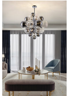 Lifestyle image of the 19-light chandelier in a luxurious foyer, radiating ethereal elegance.