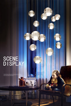 The chandelier in a cozy bedroom setting, providing an inviting crystal glow.