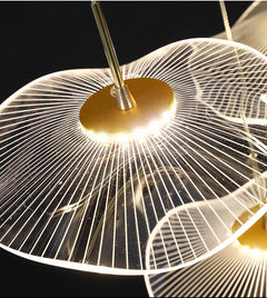 Close-up of the integrated LED lighting within the acrylic tiers, showcasing energy efficiency.