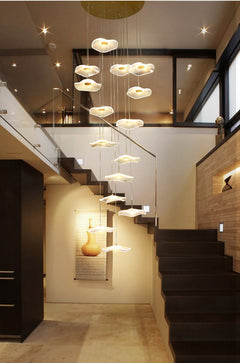 Lifestyle image of the 15-light chandelier in a luxurious living room, creating a radiant ambiance.