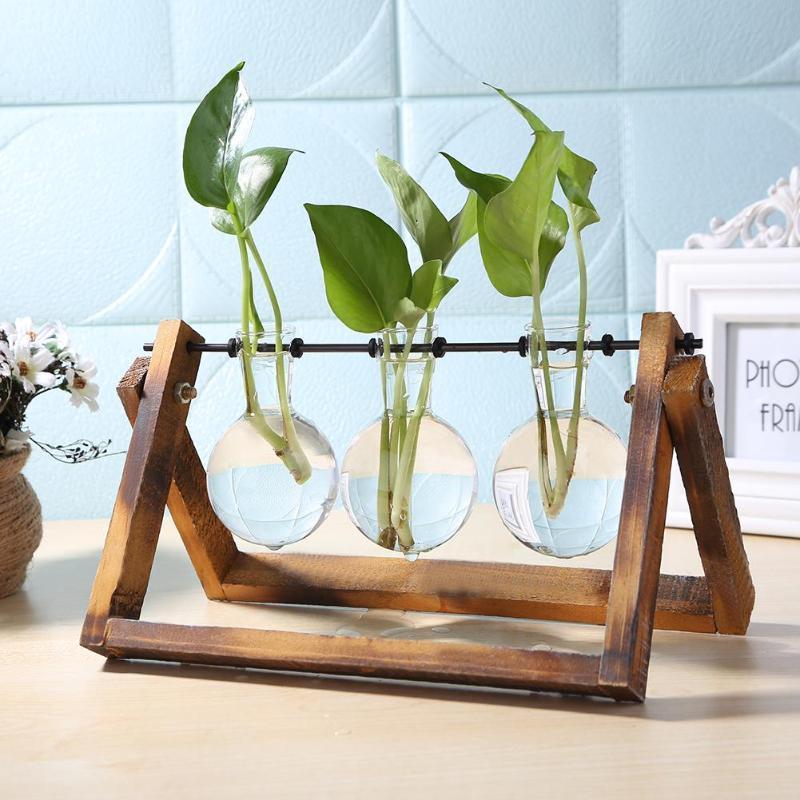 Wooden Plant Stand with a Glass Vase